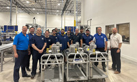 NORD employees standing with completed drive units