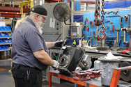 NORD employee servicing a gear unit for a customer